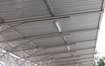 installing Bolton Houses metal roofing